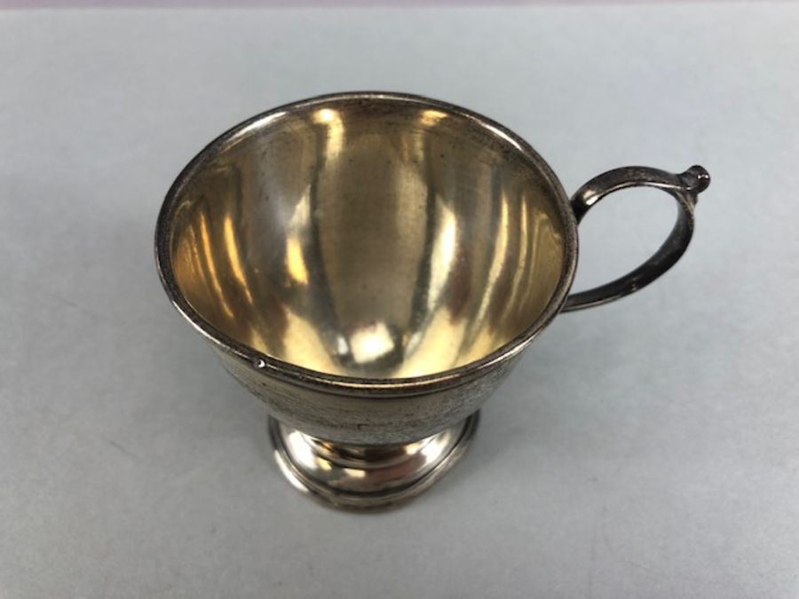 Collection of silver hallmarked items to include a silver photo frame, Silver cup, flatware and - Image 16 of 29