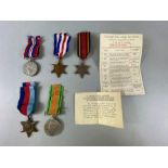 Militaria: Collection of Five WWII medals with ribbons and some paperwork