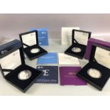 Royal Mint four sets of uncirculated proof coins to include 2020 £5 silver proof coin, 2017 £5 THE