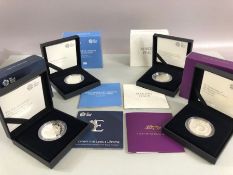 Royal Mint four sets of uncirculated proof coins to include 2020 £5 silver proof coin, 2017 £5 THE