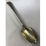 Solid Silver large straining spoon hallmarked for London, crest of a stag crown and cross dated 1774