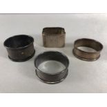 Collection of four silver hallmarked napkin rings total weight approx 55.5g
