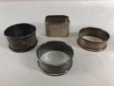 Collection of four silver hallmarked napkin rings total weight approx 55.5g