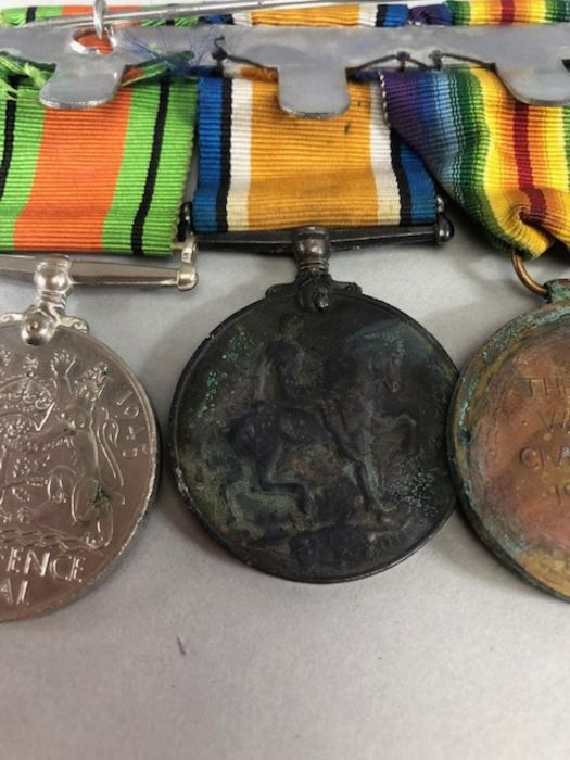 Medals: Collection of four WWI medals, trio of medals plus the George V FOR BRAVERY IN THE FIELD - Image 9 of 16