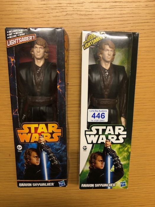 Two boxed Anakim Sky WAlker figurines by Hasbro includes lightsaber