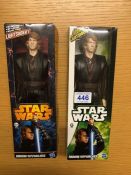 Two boxed Anakim Sky WAlker figurines by Hasbro includes lightsaber