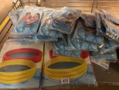 In original packaging five children's inflatable paddling pools and approx 25 pairs of inflatable