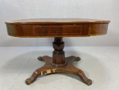 Edwardian centre table with inlay on pedestal stand with four carved, claw feet, hidden drawer to