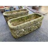 Pair of oblong garden troughs / planters with lions head detailing, each approx 71cm x 28cm x 26cm