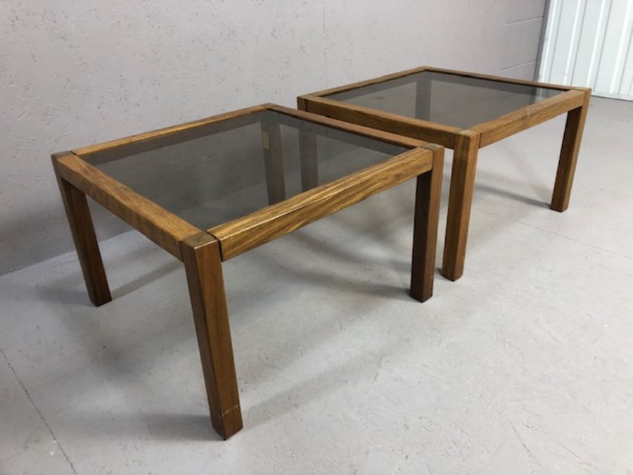 Pair of Mid Century style wooden framed coffee tables with smoky glass tops, each approx 56cm x 56cm - Image 4 of 4
