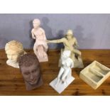 Collection of six contemporary unglazed sculptures to include a male and female bust, nude female on