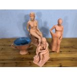 Four contemporary terracotta coloured sculptures to include nude female forms and a twin handled pot