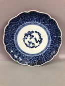 Chinese Blue and White plate decorated with Peonies and Bamboo (broken with poor repair). Blue six