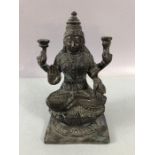 Four Armed Bronze Buddha or eastern Deity approx 14cm tall on square solid plinth