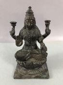 Four Armed Bronze Buddha or eastern Deity approx 14cm tall on square solid plinth