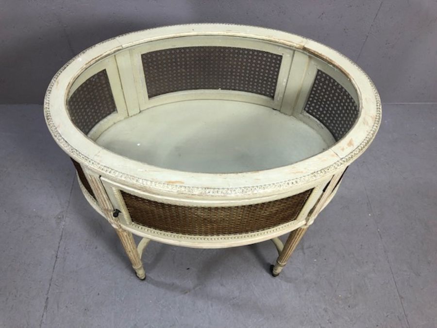 French bijouterie table on fluted tapering legs and castors, of oval form, with glass and wicker - Image 2 of 13