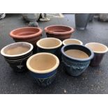 Collection of eight terracotta garden pots