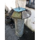 Tall marble pillar with staddle stone top, with sundial affixed. Total height approx 110cm