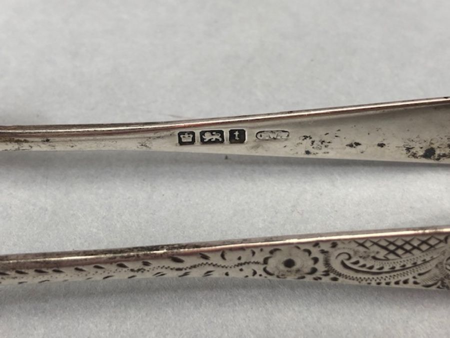 Silver flatware to include Silver hallmarked sugar nips one Georgian *2 and a silver fish fork - Image 21 of 32