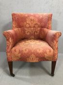 Antique tub chair with tapering legs, on castors, good upholstery project