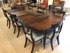 Antique Georgian dining table with D Ends, on turned tapering legs, with two leaves and
