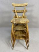 Set of four early Ercol tapered, stick back stacking chairs