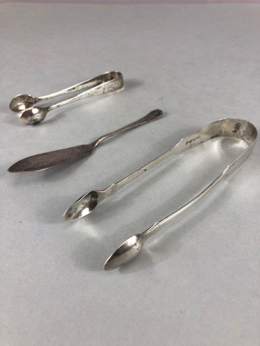 Silver flatware to include Silver hallmarked sugar nips one Georgian *2 and a silver fish fork - Image 18 of 32