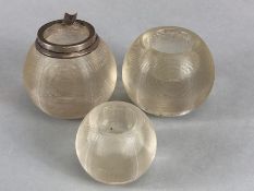 Three Glass match strikers of ribbed globular form the largest with a silver top makers mark RP