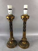 Pair of wooden gilt and painted candlesticks, approx 35cm in height