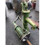 Two vintage cast iron pumps