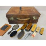 Gentleman's Luggage: Vintage leather travelling case with red silk lining and compartments for