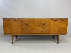 Mid century teak sideboard by Beautility, with four drawers including cutlery drawer and two side