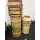 Two terracotta chimney pots, the tallest approx 103cm in height