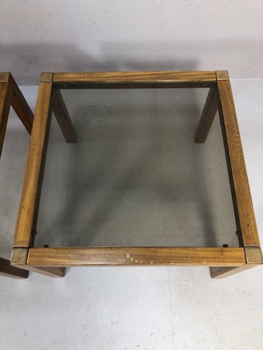 Pair of Mid Century style wooden framed coffee tables with smoky glass tops, each approx 56cm x 56cm - Image 2 of 4