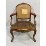 Cane seated and backed antique armchair (A/F)