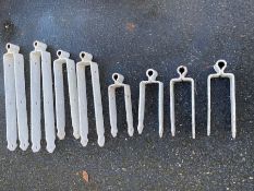 Collection of large metal hinges