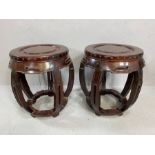 Early 20th Century pair of Chinese hard-wood carved stools, of drum form, supported by five