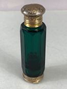 Victorian double ended scent and vinaigrette bottle in green glass with two hinged lids