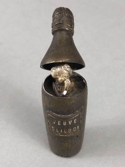 Advertising - an early 20th century metal miniature novelty vesta case, in the form of a bottle of - Image 4 of 4