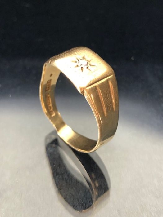 9ct Gold signet ring set with a single diamond, fully hallmarked in a star setting, fully hallmarked