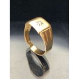 9ct Gold signet ring set with a single diamond, fully hallmarked in a star setting, fully hallmarked