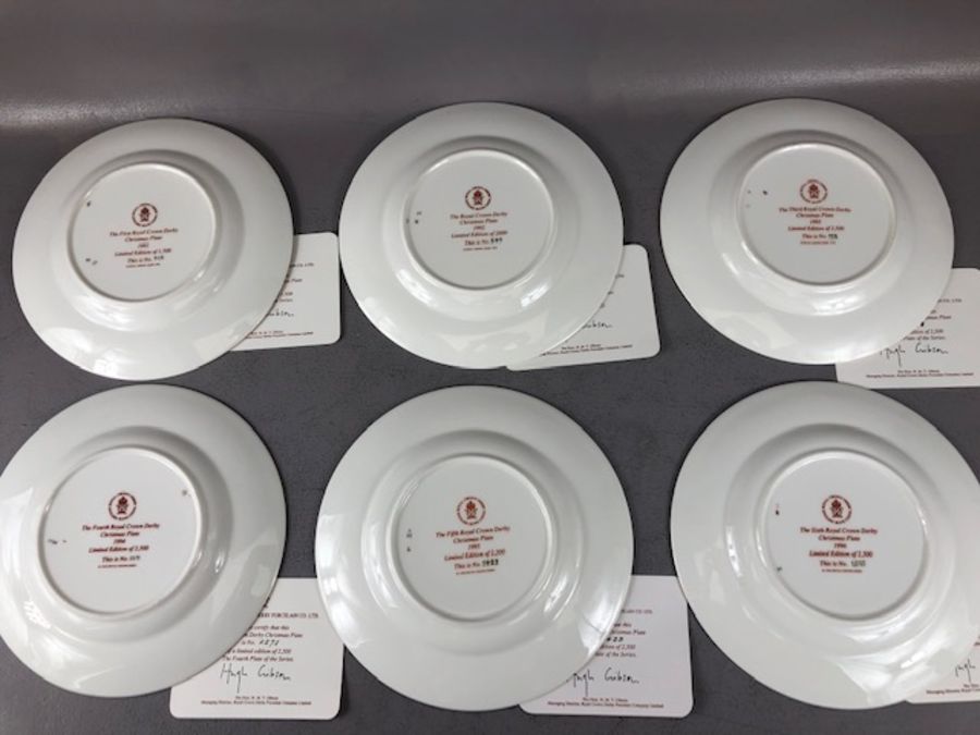 Six Royal Crown Derby limited edition Christmas collectors plates, 1991 - 1996 inclusive, unboxed, - Image 8 of 8