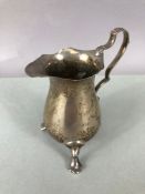 Silver hallmarked Milk/cream jug on three feet hallmarked for Sheffield by maker James Deakin & Sons