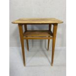 Mid century style side table with slated shelf and tapering legs