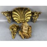 Collection of five gilt-wood decorative pieces to include three Italian sconces, a cherub head and