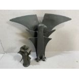 Two contemporary black clay sculptures, one in the shape of an eagle and approx 60cm in height