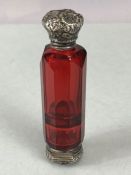 Cranberry Victorian glass double ended scent and vinaigrette bottle with faceted glass and one