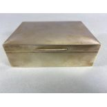 Silver Hallmarked cigarette box, hinged lid, wooden lined approx 11.5 x 8.6 x 3.8cm and hallmarked