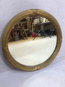 Antique circular gilt-framed mirror (A/F), approx 62cm in diameter