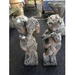 Pair of decorative garden cherubs, each approx 60cm in height